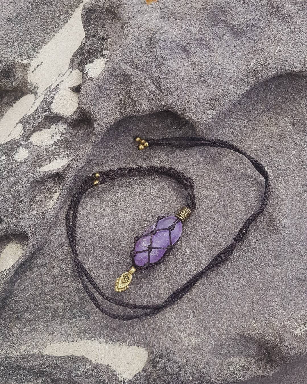 Amethyst crystal macrame necklace with brown cord and brass beads