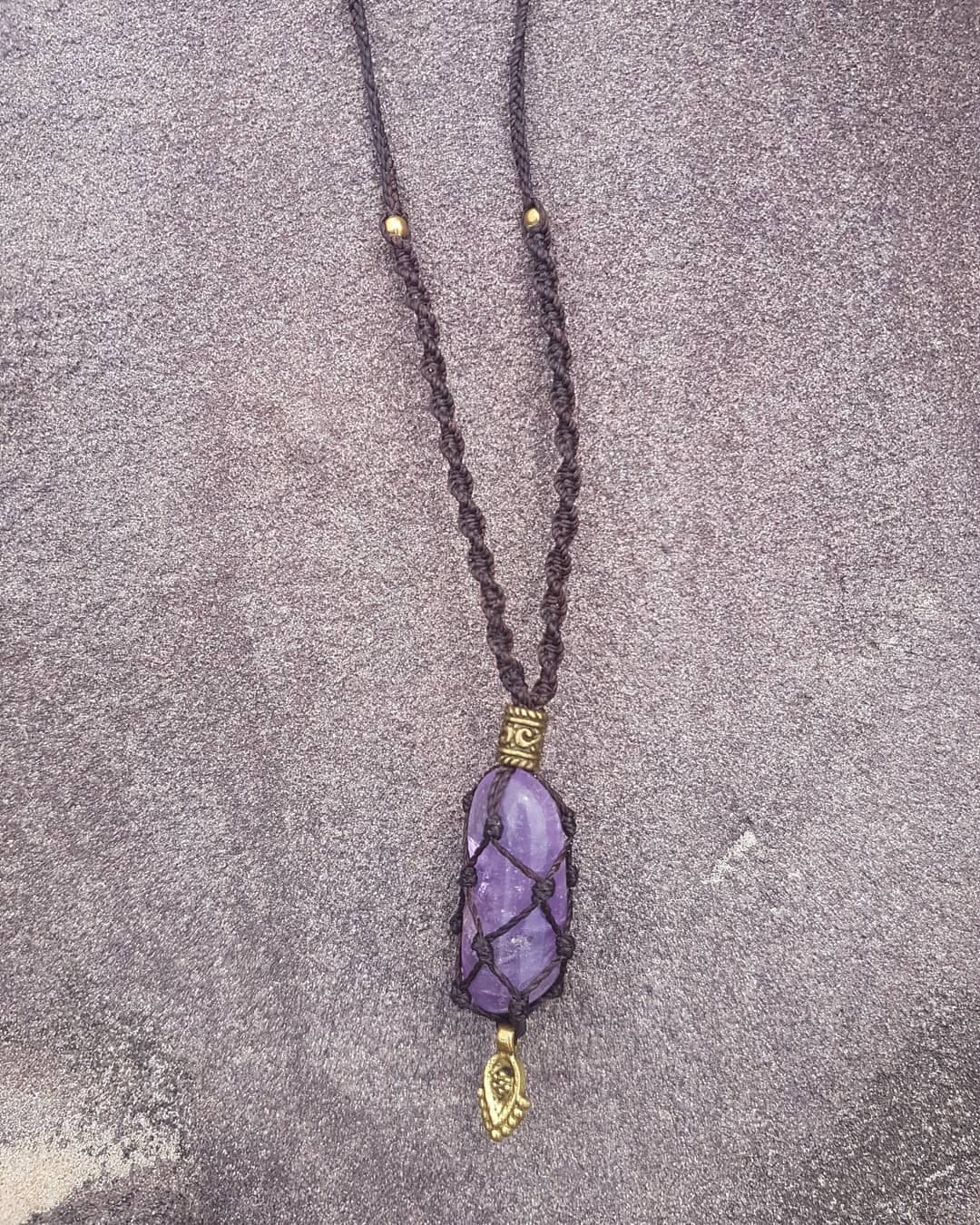 Amethyst crystal macrame necklace with brown cord and brass beads