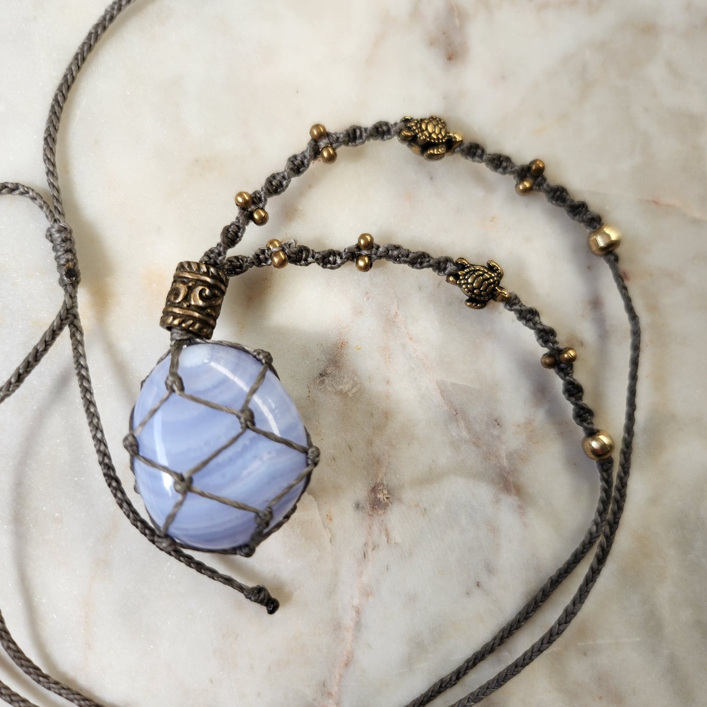 Blue lace agate crystal handmade macrame necklace with brass turtle beads