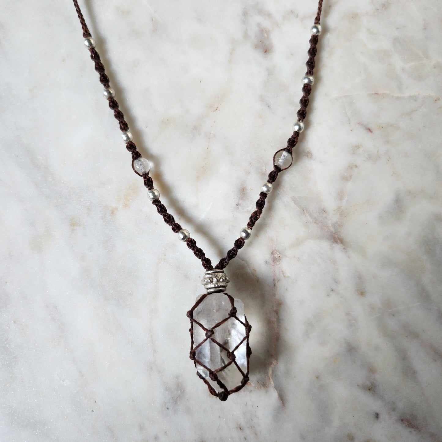 Quartz point crystal handmade macrame necklace with red/brown cord and silver beads