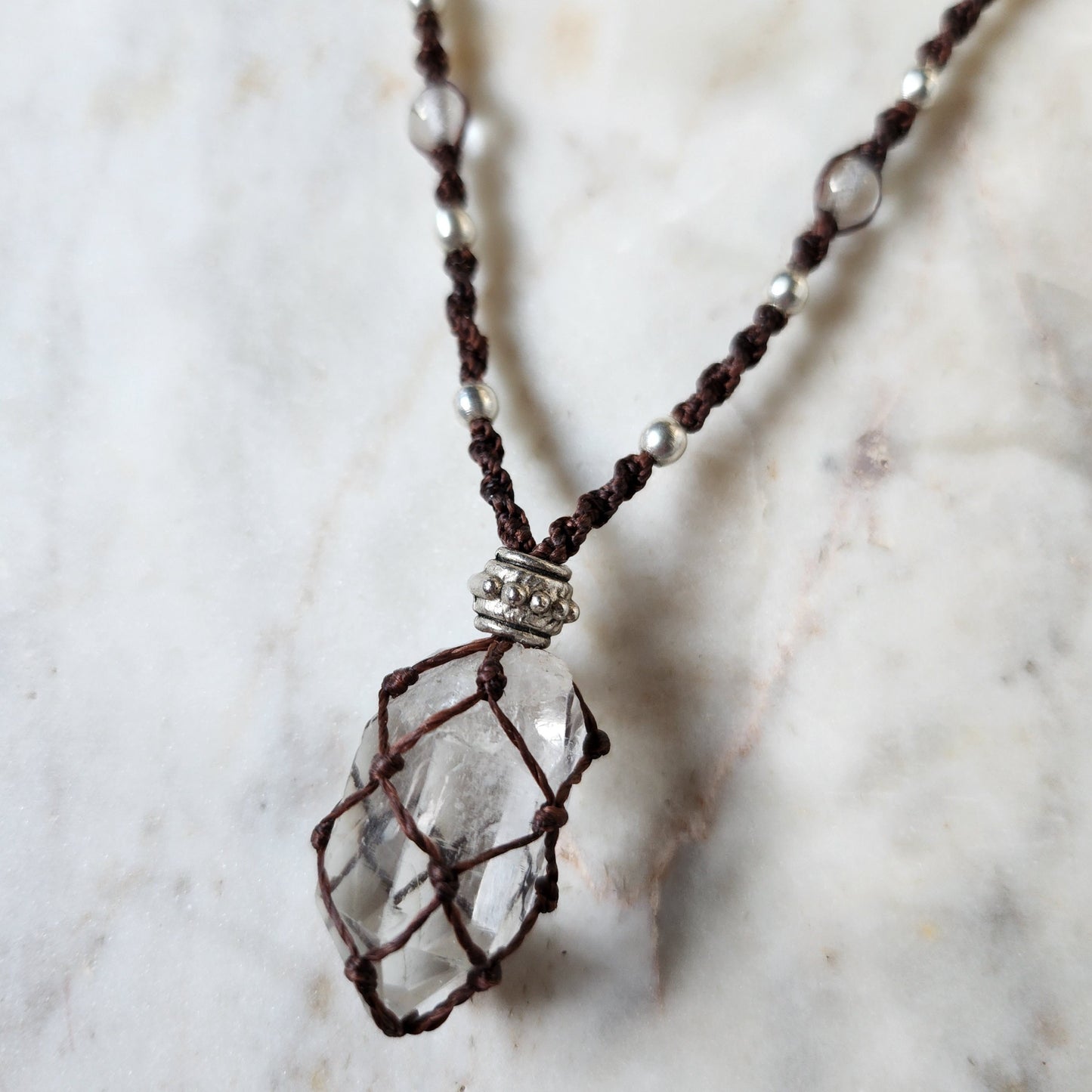 Quartz point crystal handmade macrame necklace with red/brown cord and silver beads