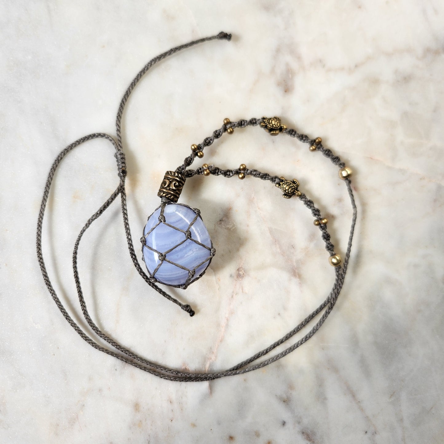 Blue lace agate crystal handmade macrame necklace with brass turtle beads