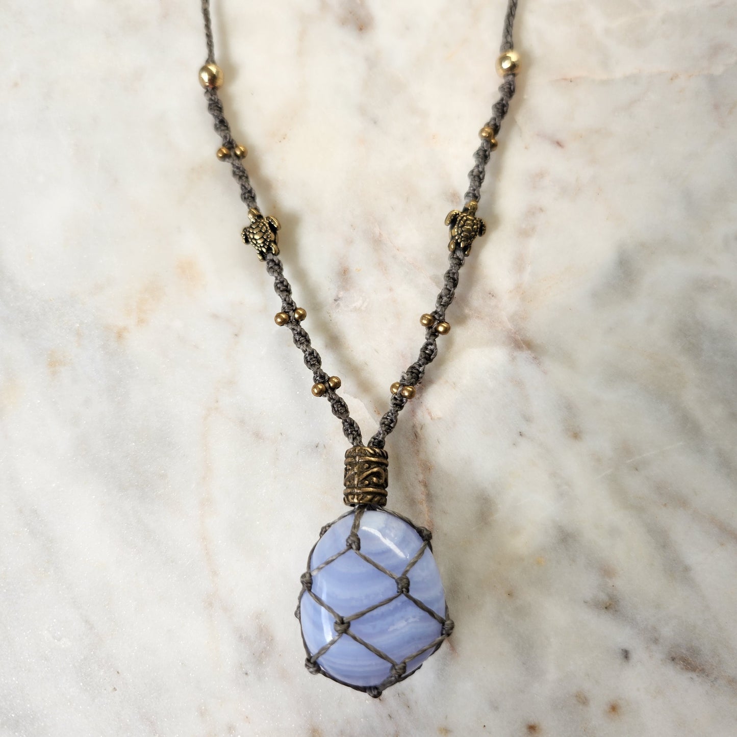 Blue lace agate crystal handmade macrame necklace with brass turtle beads